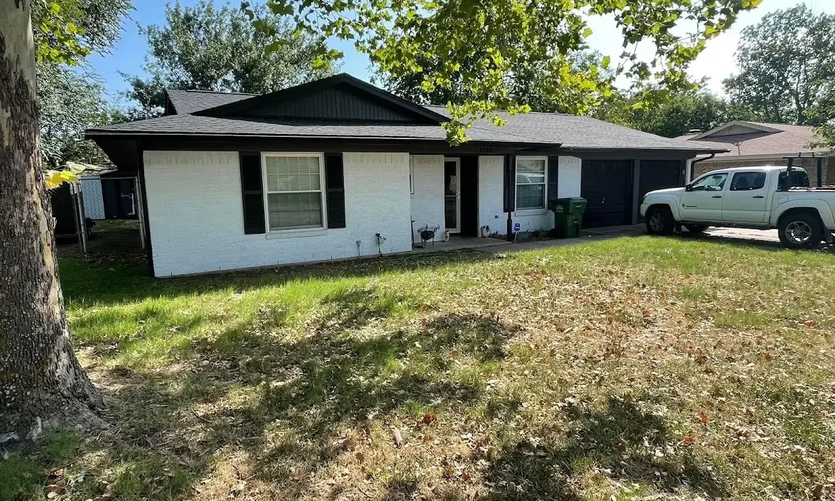 Professional roofing crew working on a residential roof in Mahtomedi